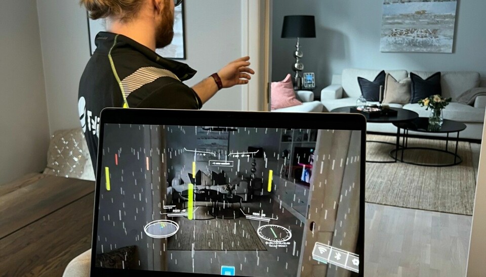 Ved hjelp av AR-briller kan Telias servicefolk se wifi-signalene i rommet. Det de ser gjennom brillene vises her på PC-skjermen. Ved å klikke på stolpene 'i løse lufta' kommer informasjon opp.
