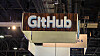 Github logo Bildet er tatt på en messe.